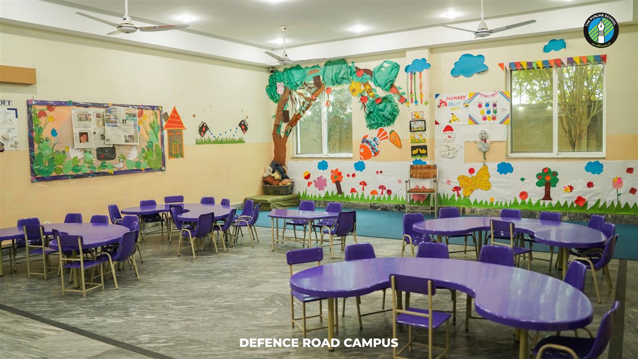 Early years classroom decorated with children’s artwork