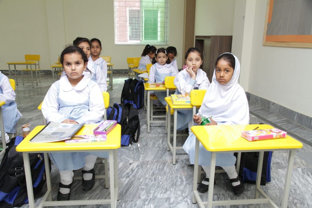 Girls working at their desks in a Punjab School classroom